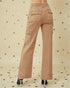 Tan cargo pants on a patterned background