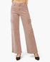 A model is wearing a pair of wide-leg cargo pants in a dusty rose or mauve color, paired with black pointed-toe heels, against a clean white studio background.