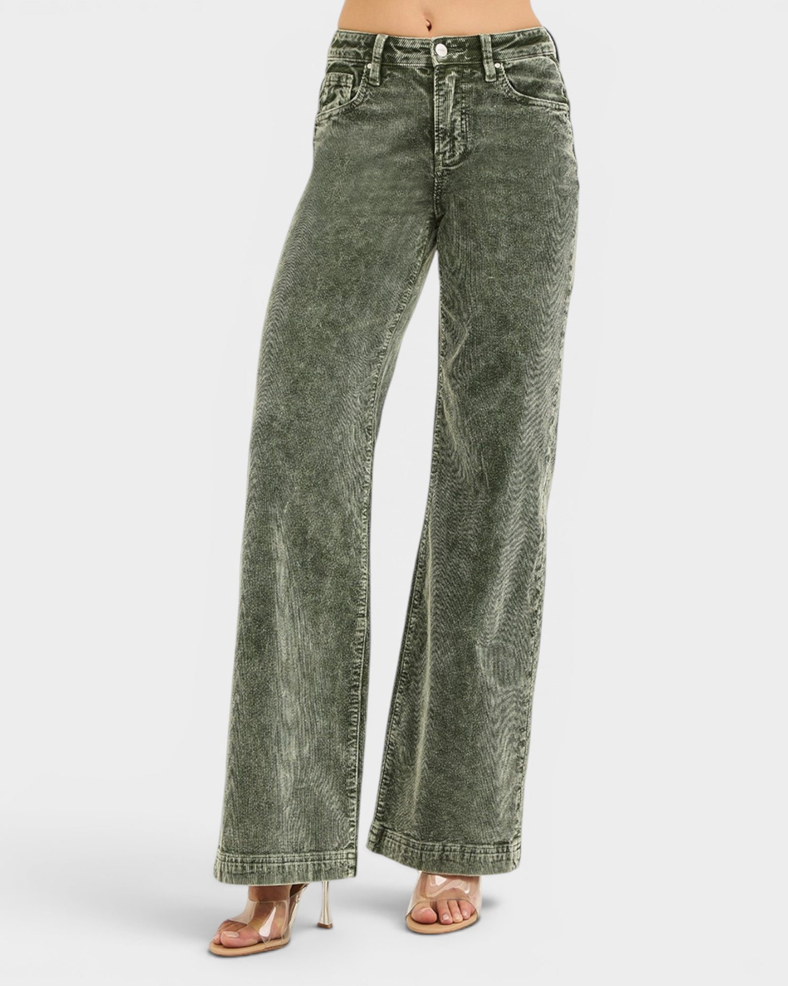 Green acid-wash jeans on a white background