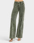 Green acid-wash jeans on a white background