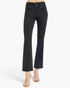 Black high-waisted cropped flare jeans with distressed details on the knees, shown on a model wearing clear high-heeled sandals against a white studio background.