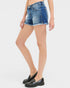 Denim shorts worn by a person on a white background