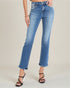 Person wearing blue jeans on a plain background