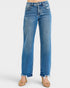 Blue jeans with frayed hems on a white background