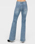 Light blue flared jeans on a white background