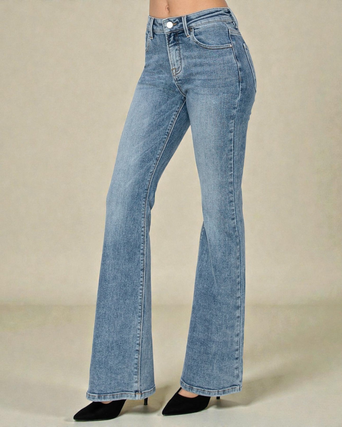 Blue jeans on a beige background