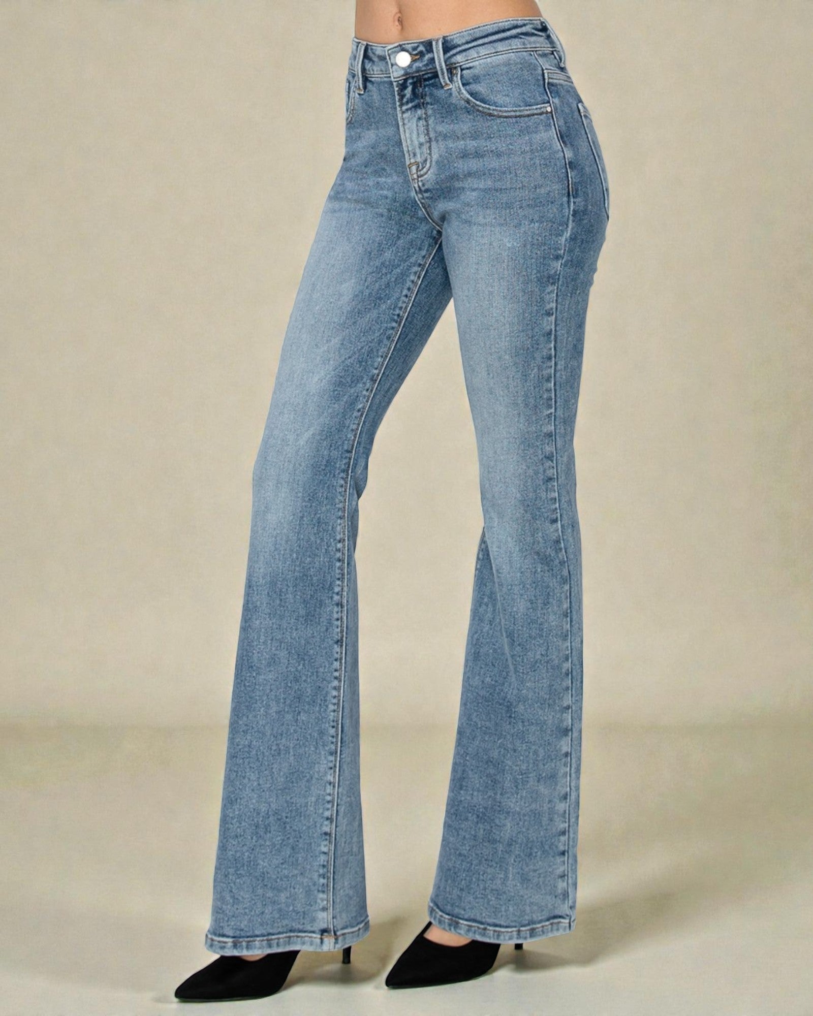 Blue jeans on a beige background
