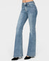Blue flared jeans on a white background