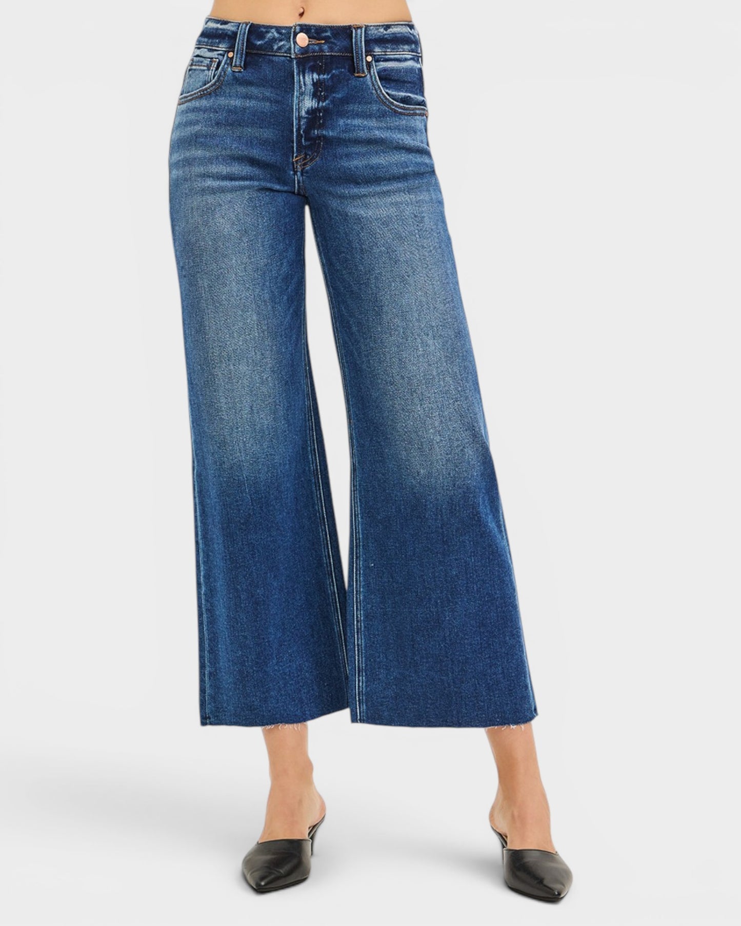 Blue wide-leg jeans on a white background