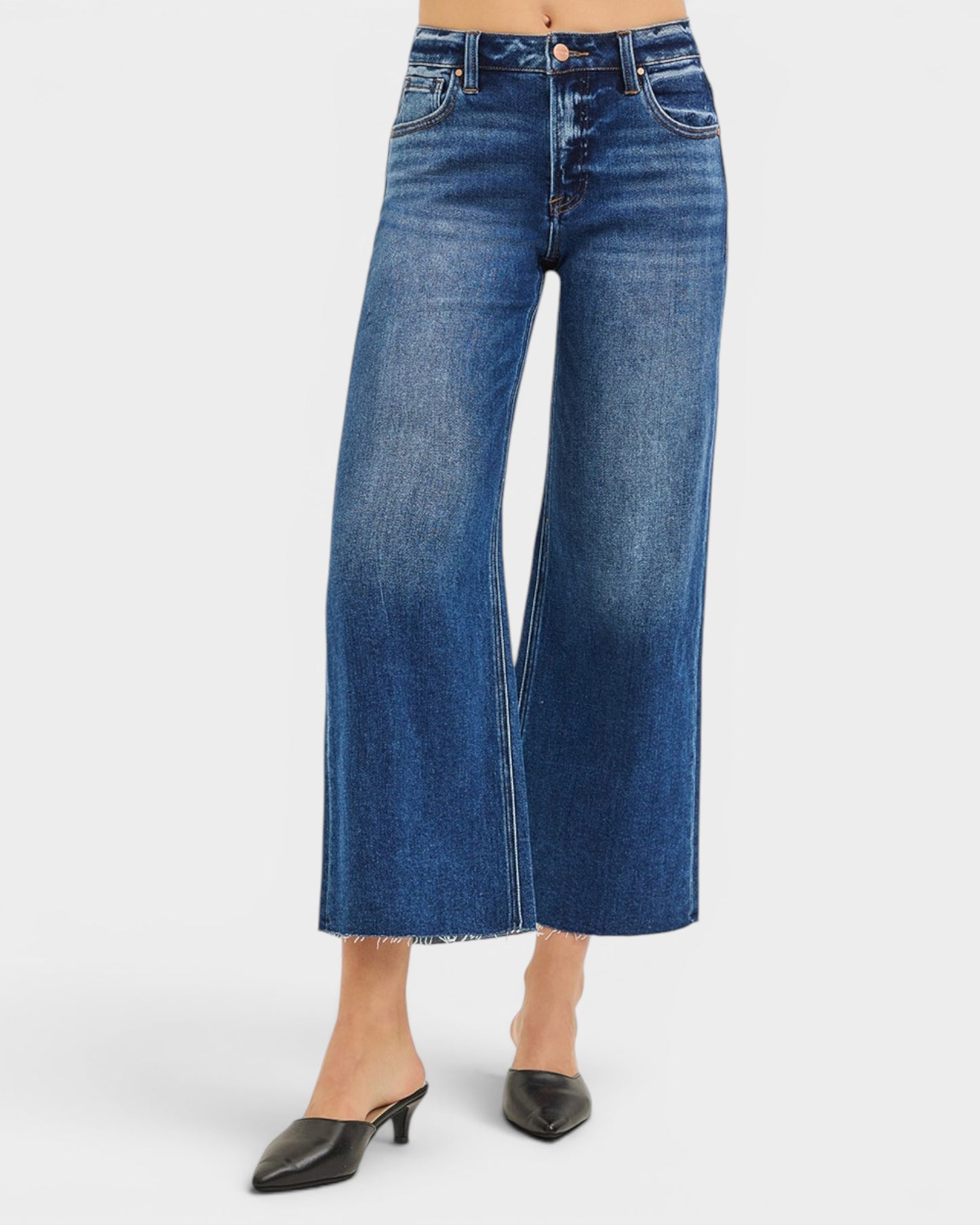 Blue wide-leg jeans on a white background