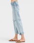 Light blue jeans worn by a person on a white background