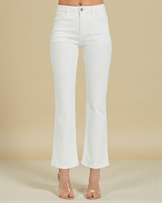 White jeans worn by a person on a beige background