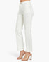 White cropped jeans shown on a model from the waist down, paired with clear strap high-heeled sandals against a clean white studio background.