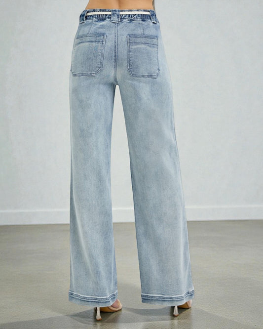 Light blue jeans on a plain background