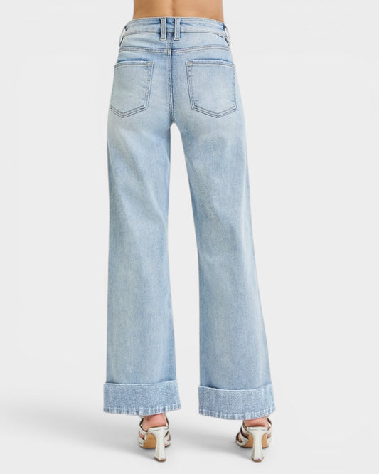 Light blue jeans with a white background