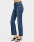 Blue jeans worn by a person on a white background