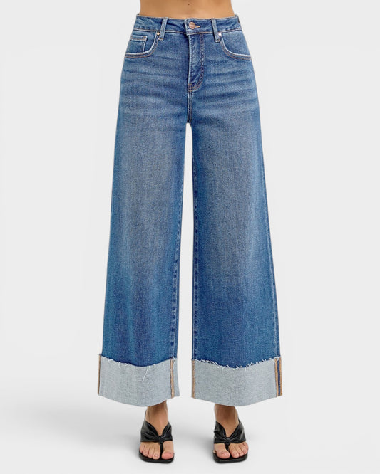 Wide-leg jeans with a gradient blue finish on a white background