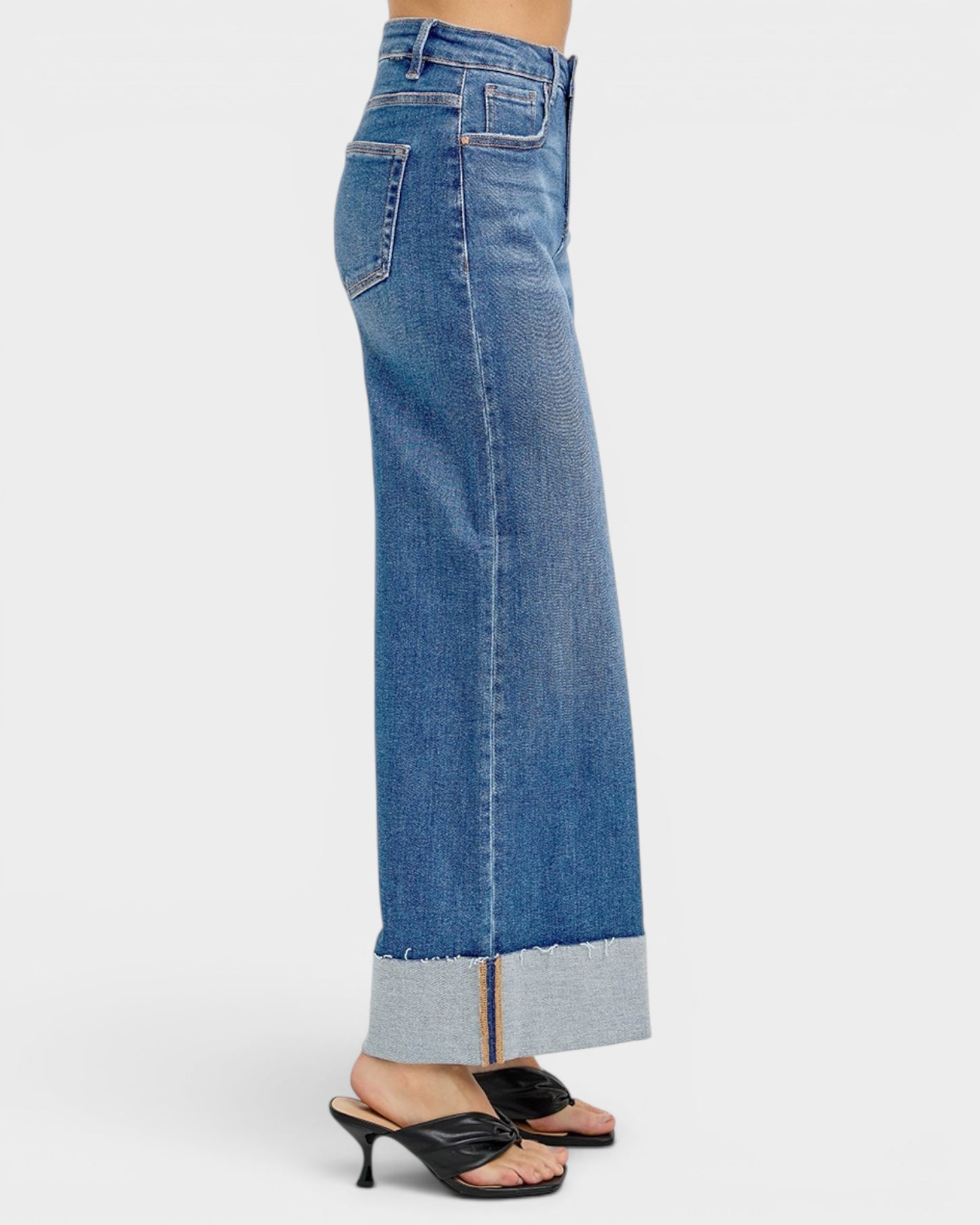 Blue jeans with a white background