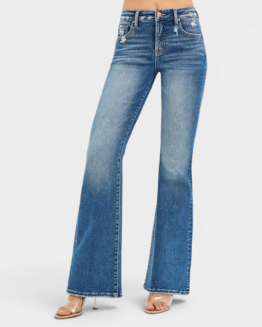 Blue flared jeans on a white background