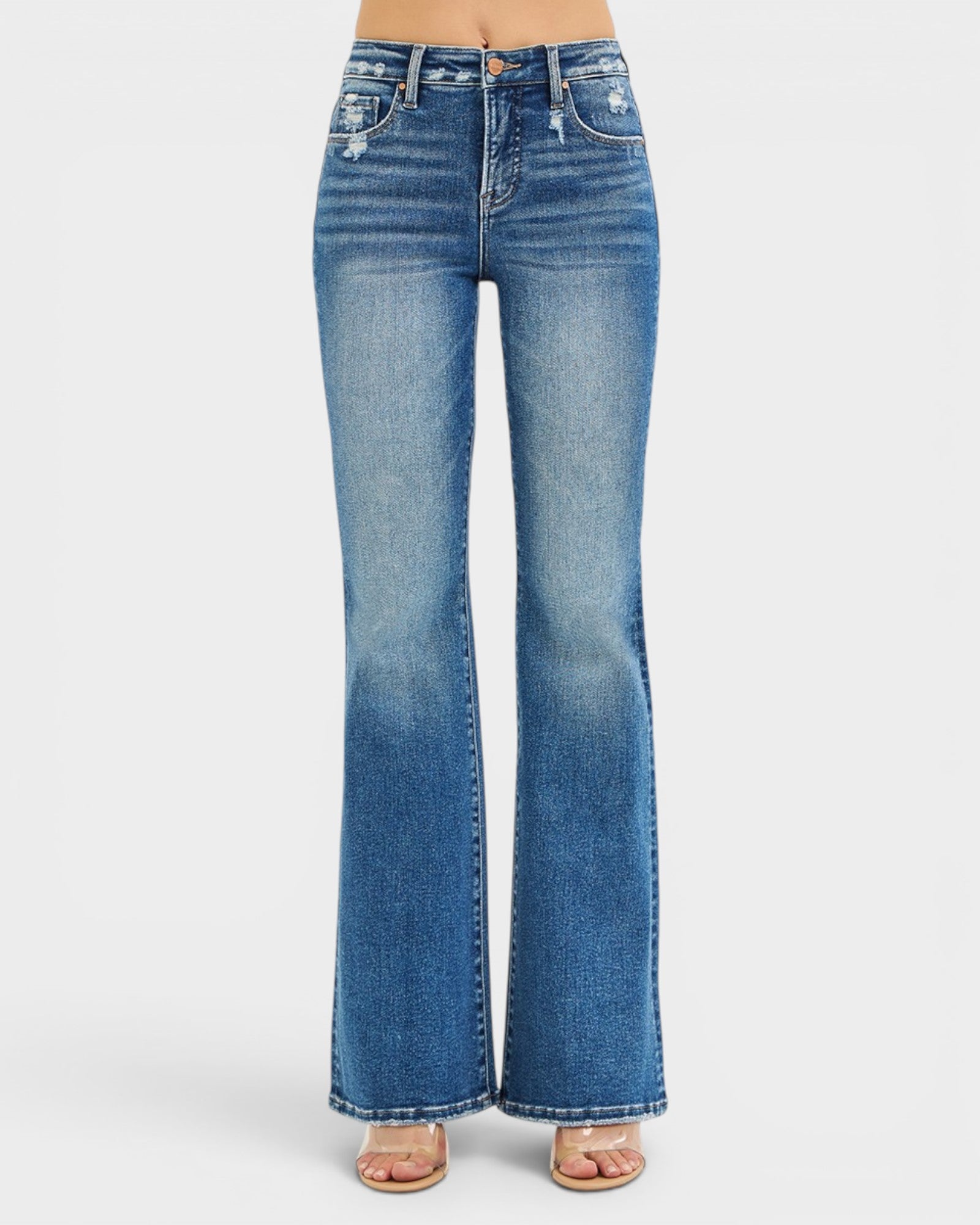 Blue flared jeans on a white background