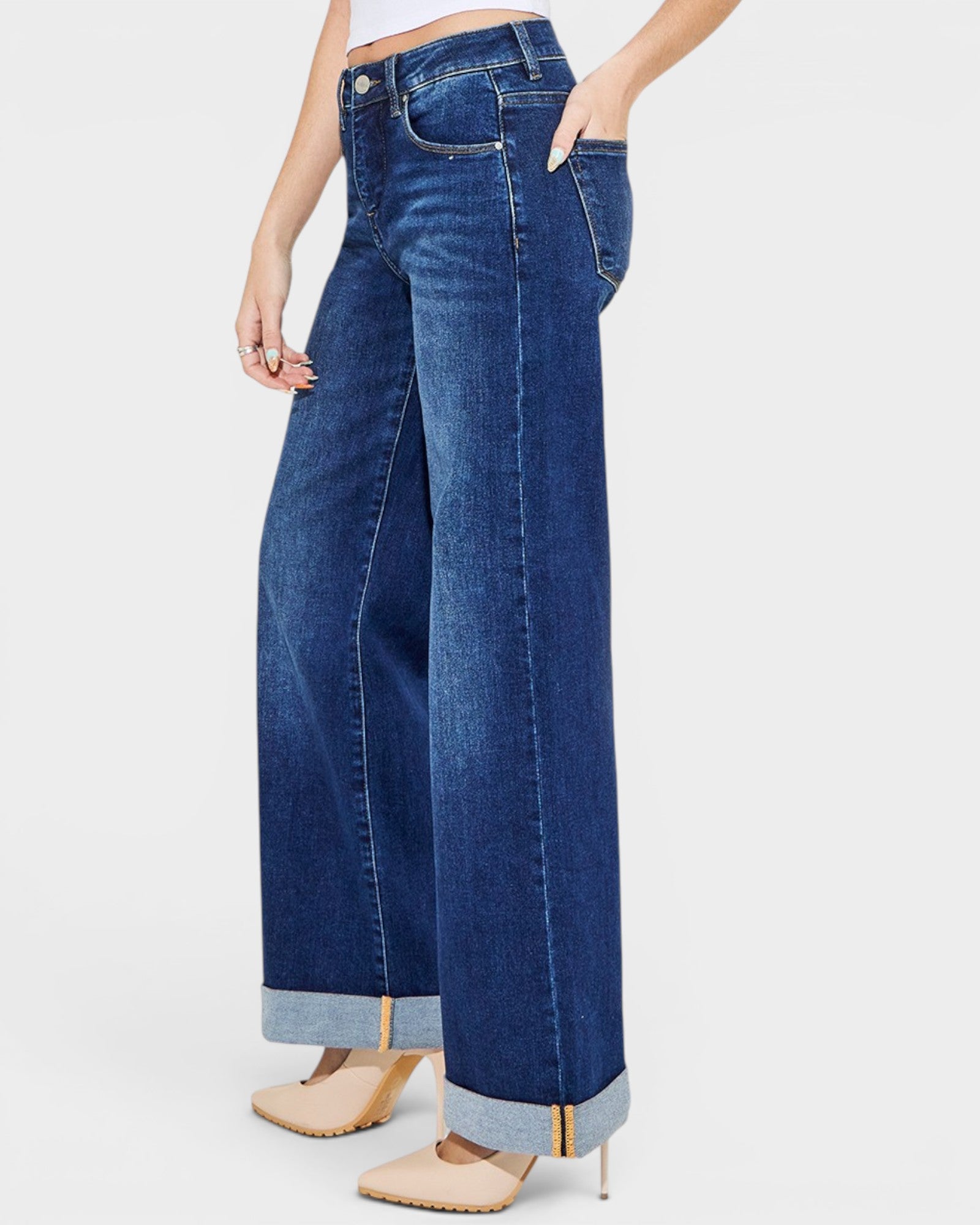 Wide-leg jeans worn by a person on a white background