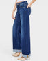 Wide-leg jeans worn by a person on a white background