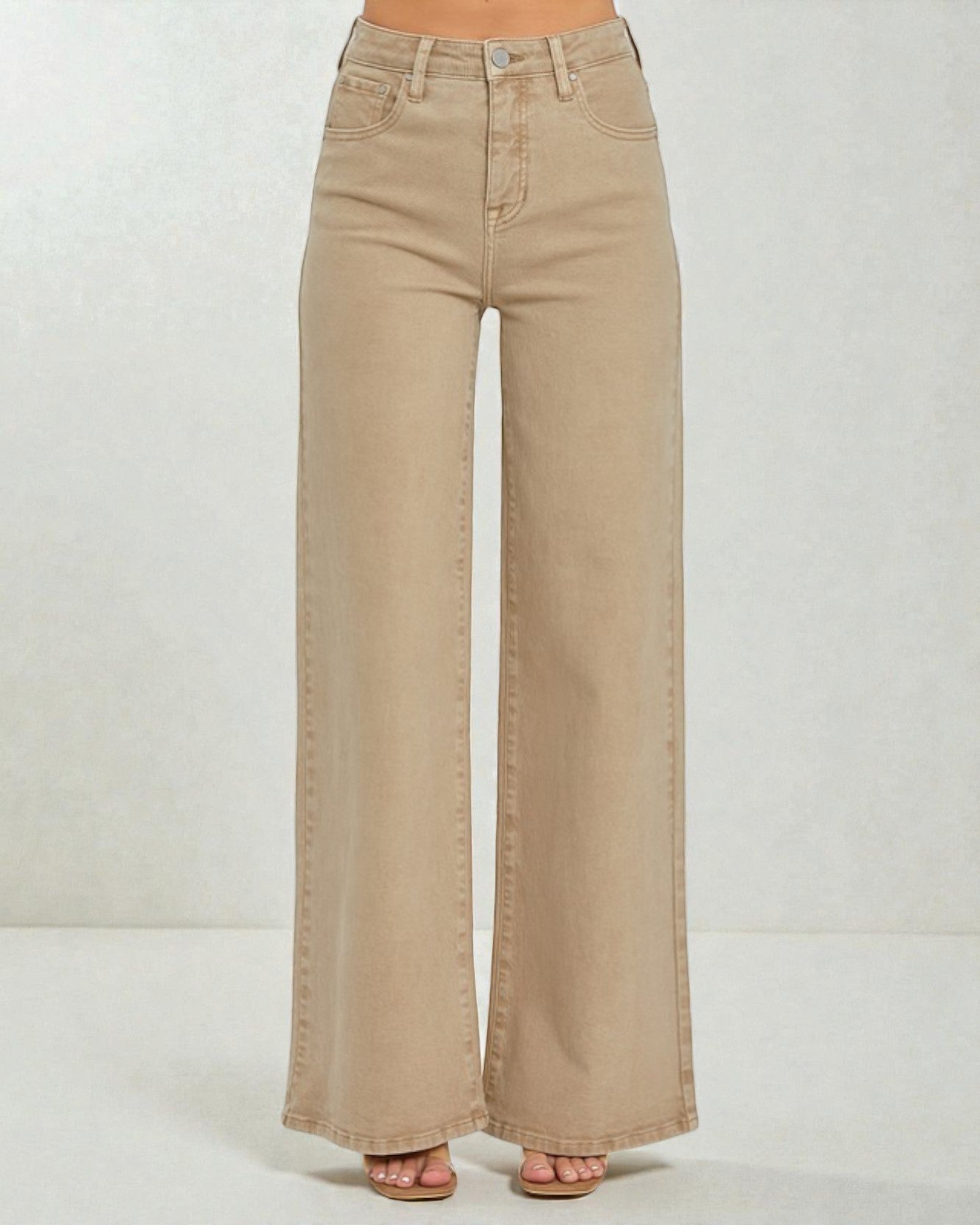 Beige wide-leg jeans on a white background
