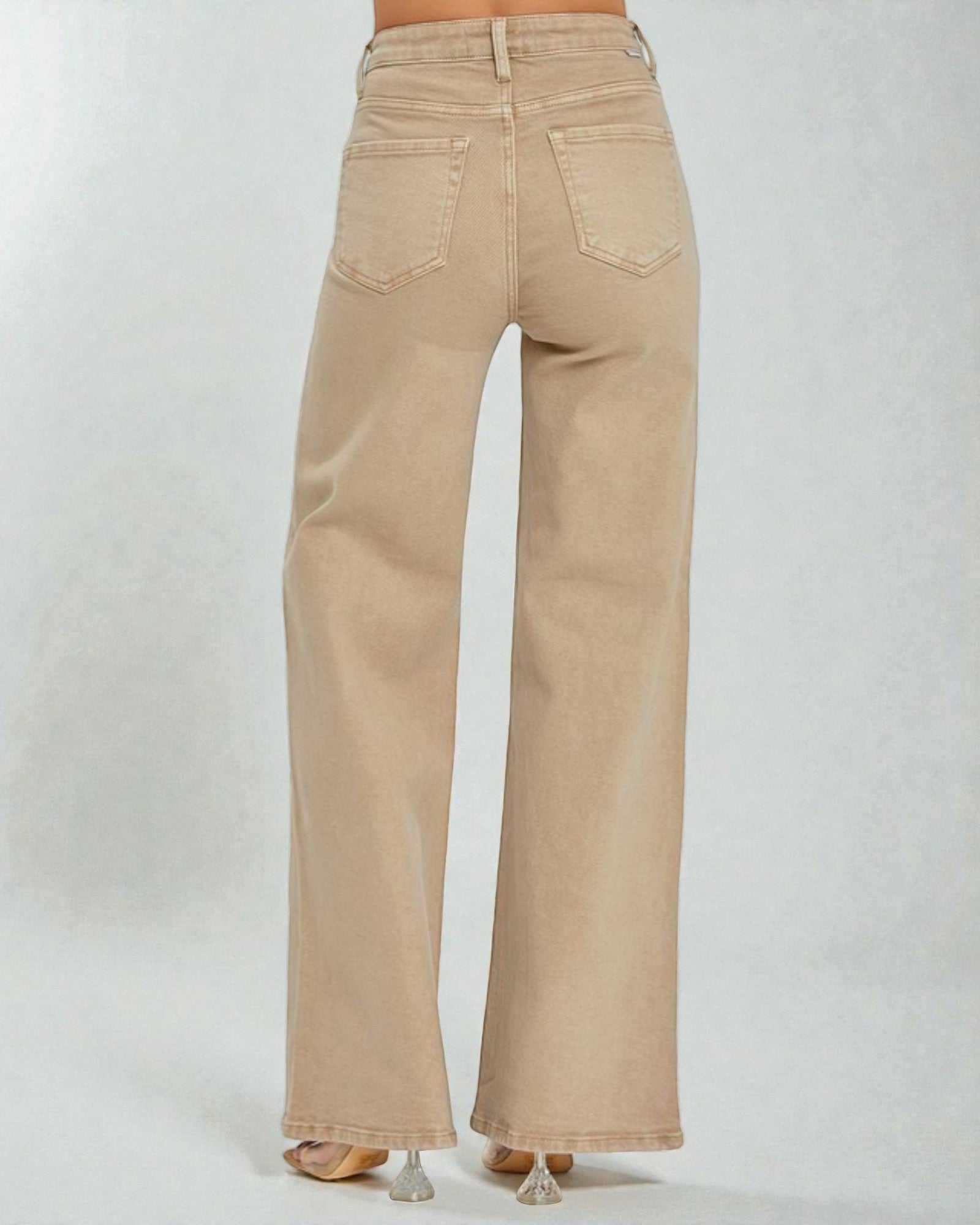 Beige wide-leg jeans on a white background