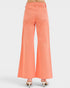 Coral wide-leg pants on a white background