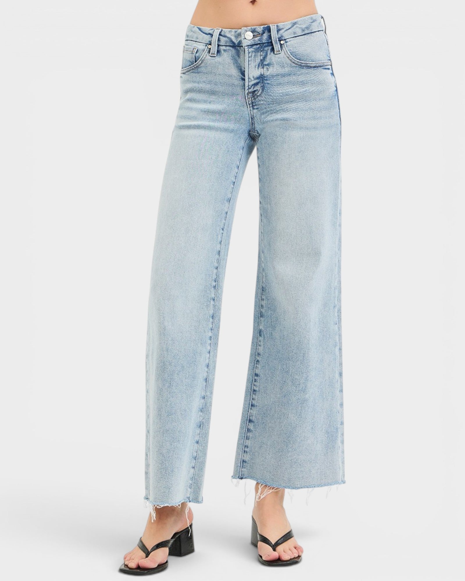 Light blue jeans on a white background