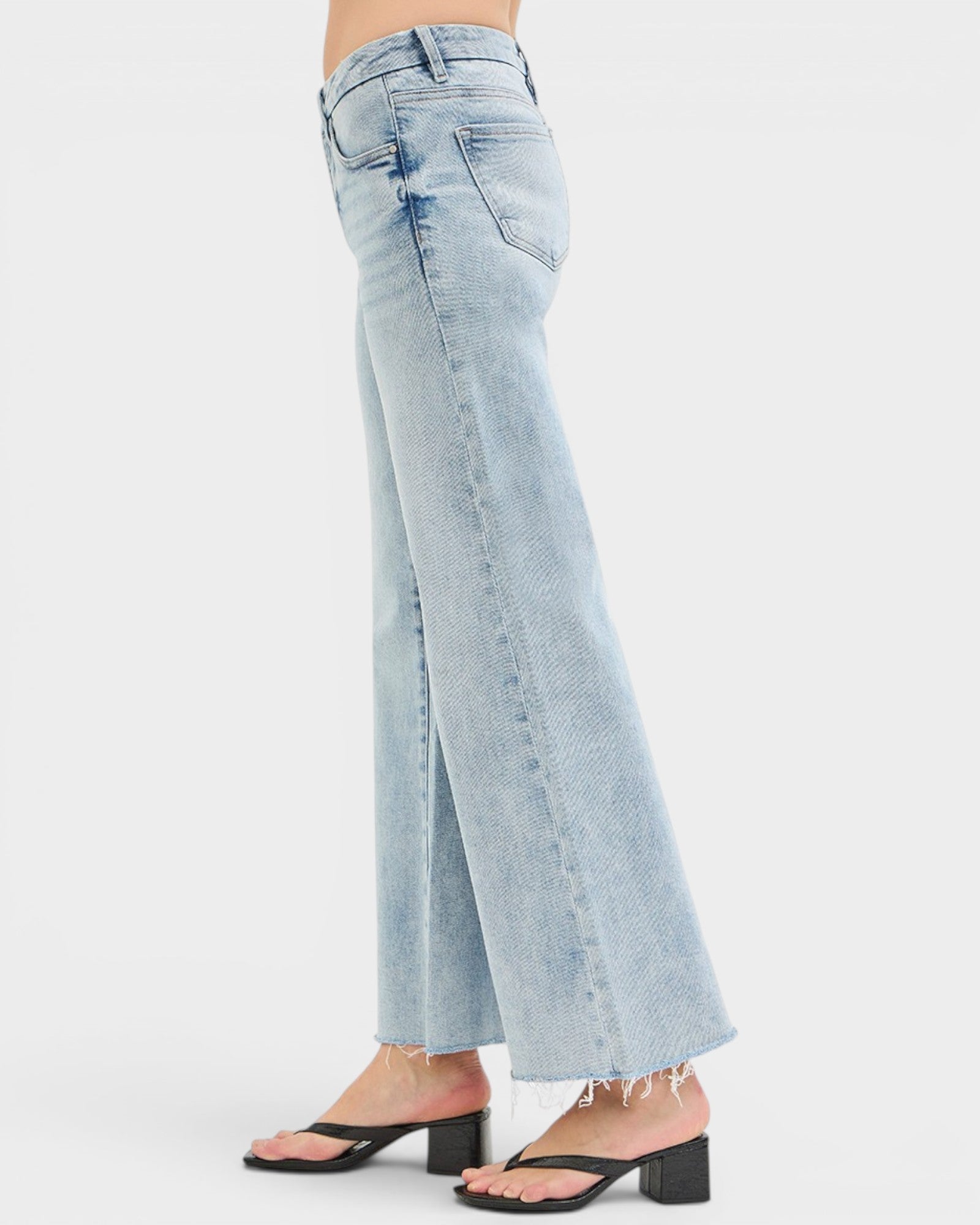 Light blue wide-leg jeans on a white background