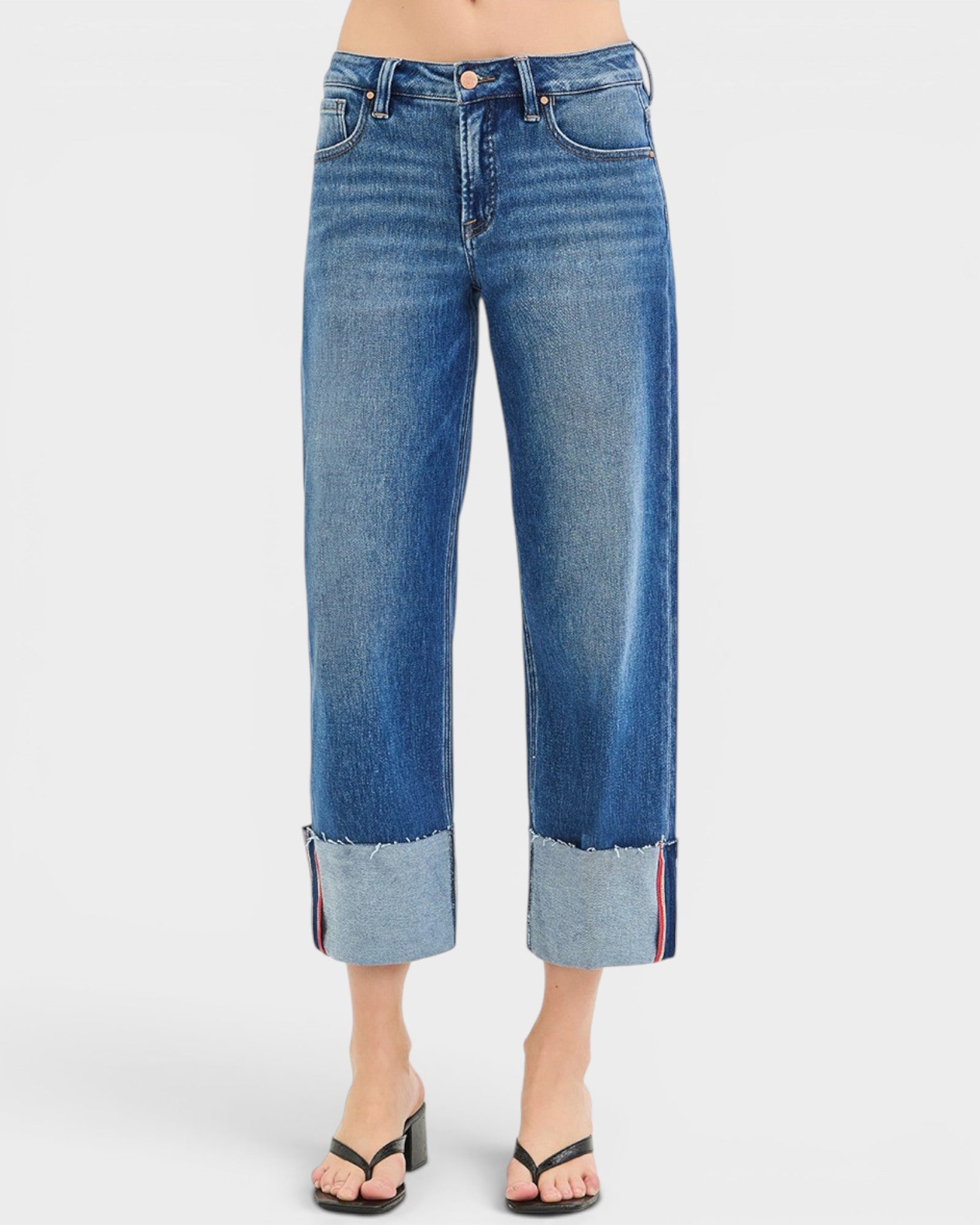 Blue jeans with a white background