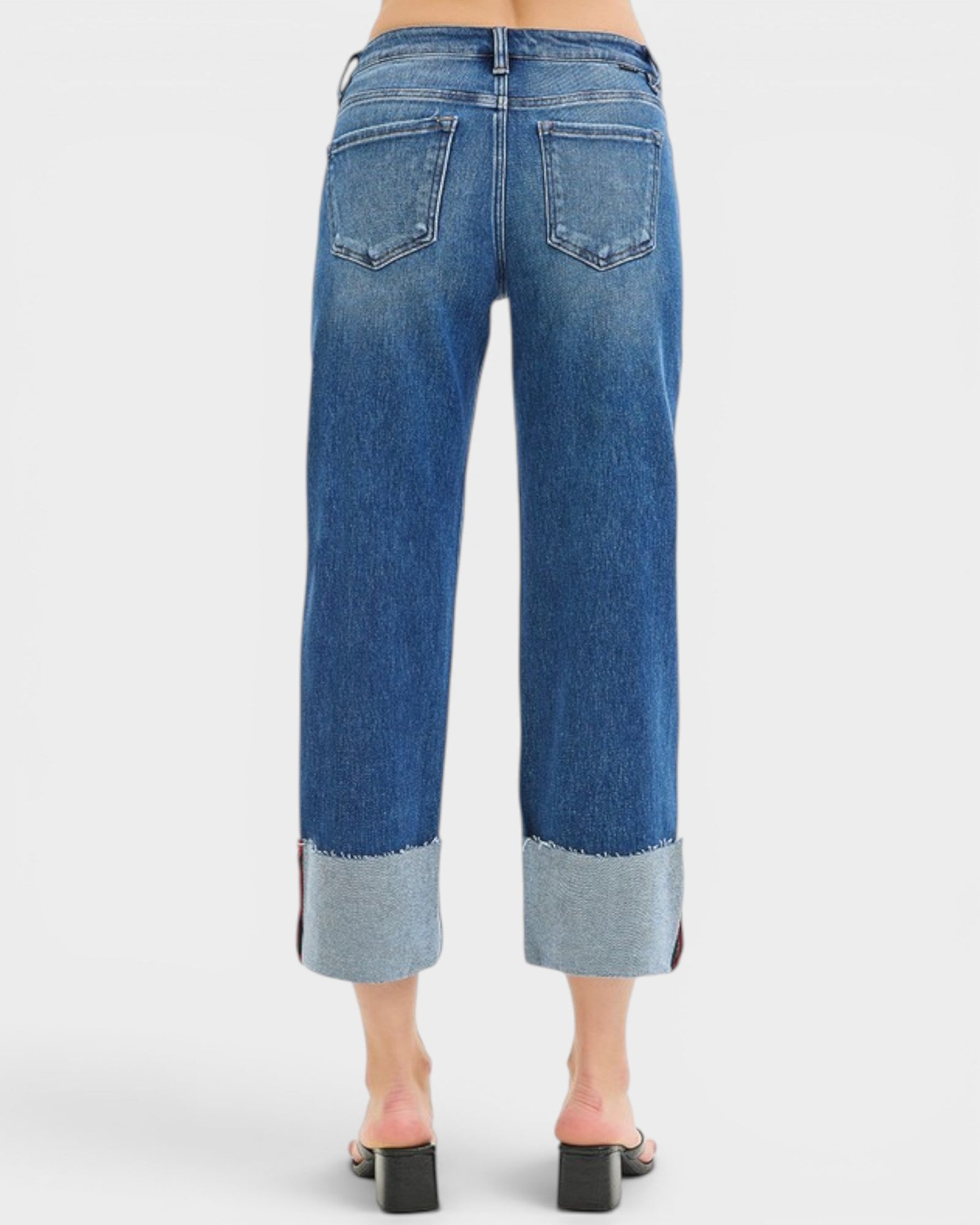 Blue jeans with a white background