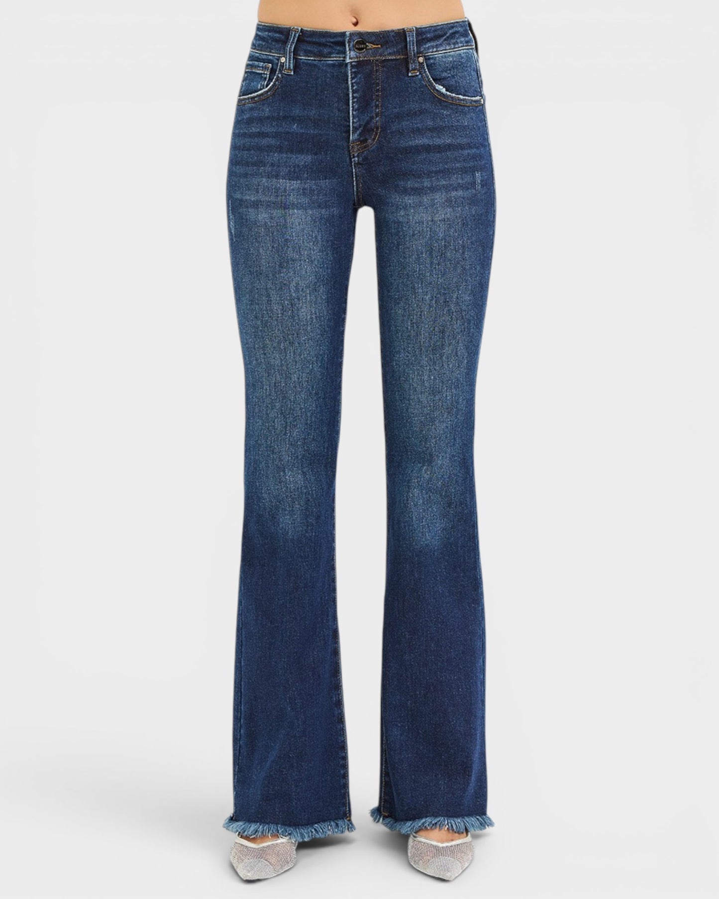 Blue flared jeans on a white background