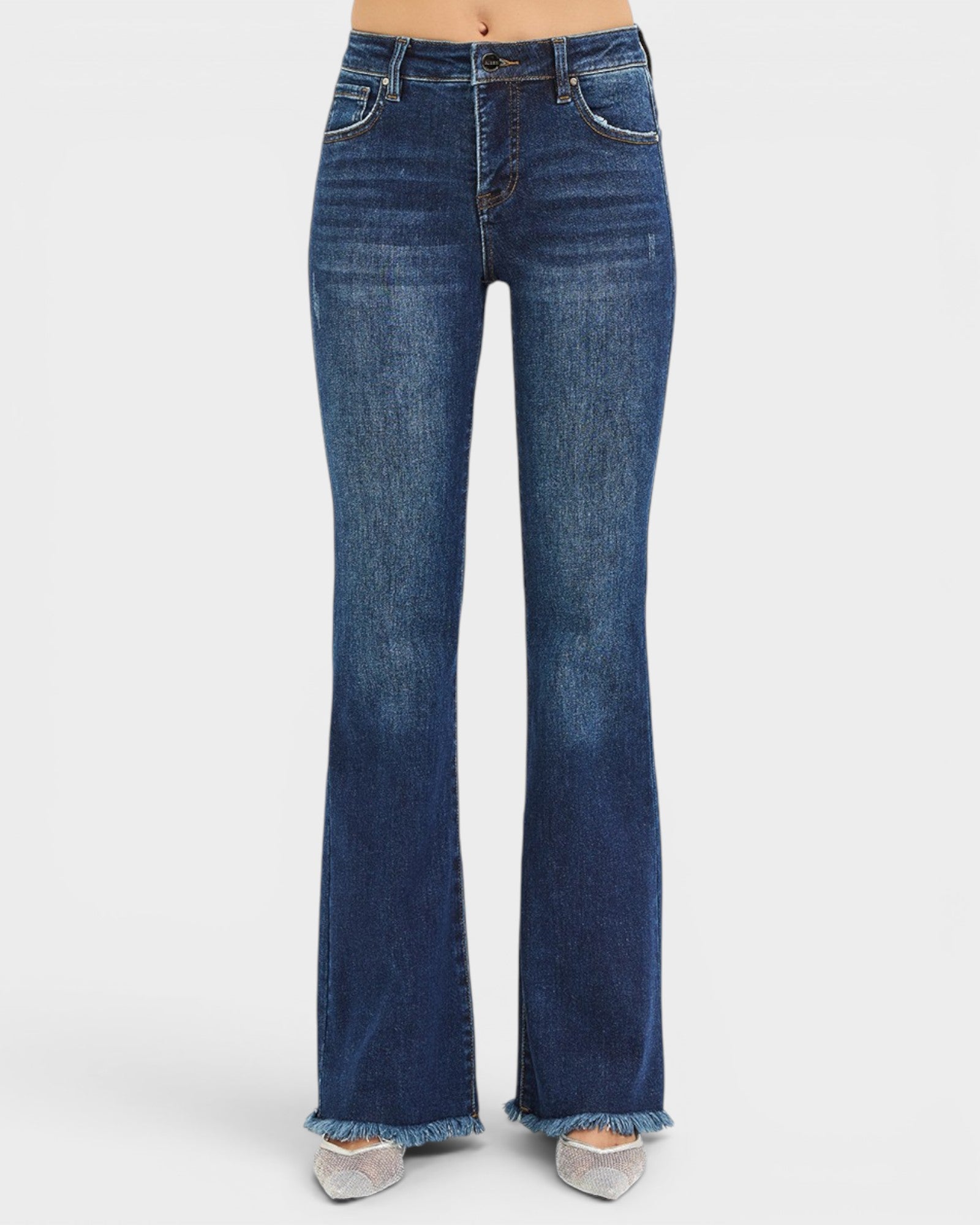 Blue flared jeans on a white background