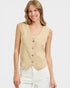 Woman wearing a beige vest on a white background