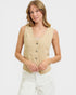 Woman wearing a beige vest on a white background