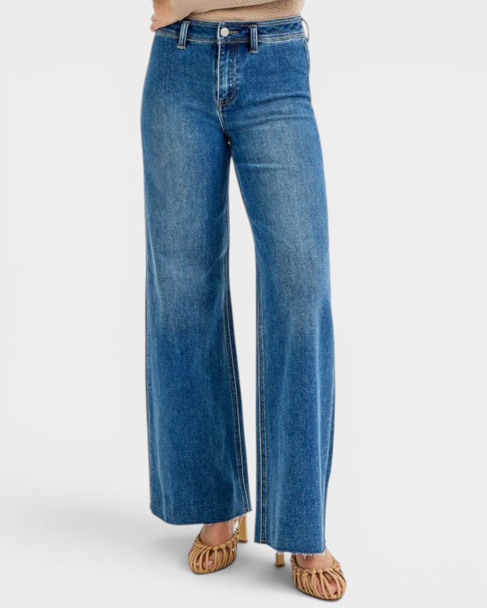 Blue wide-leg jeans on a white background