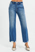 Blue jeans worn by a person on a white background