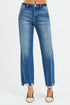 Blue jeans worn by a person on a white background