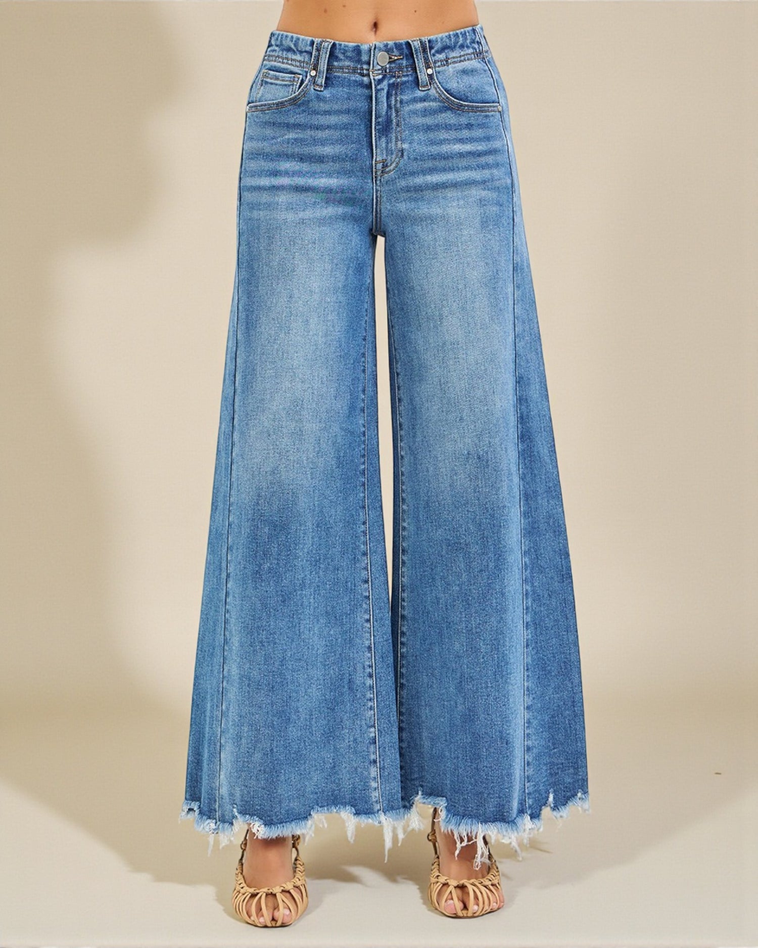 Wide-leg jeans on a neutral background