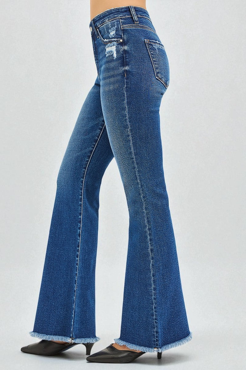 Blue flared jeans on a white background