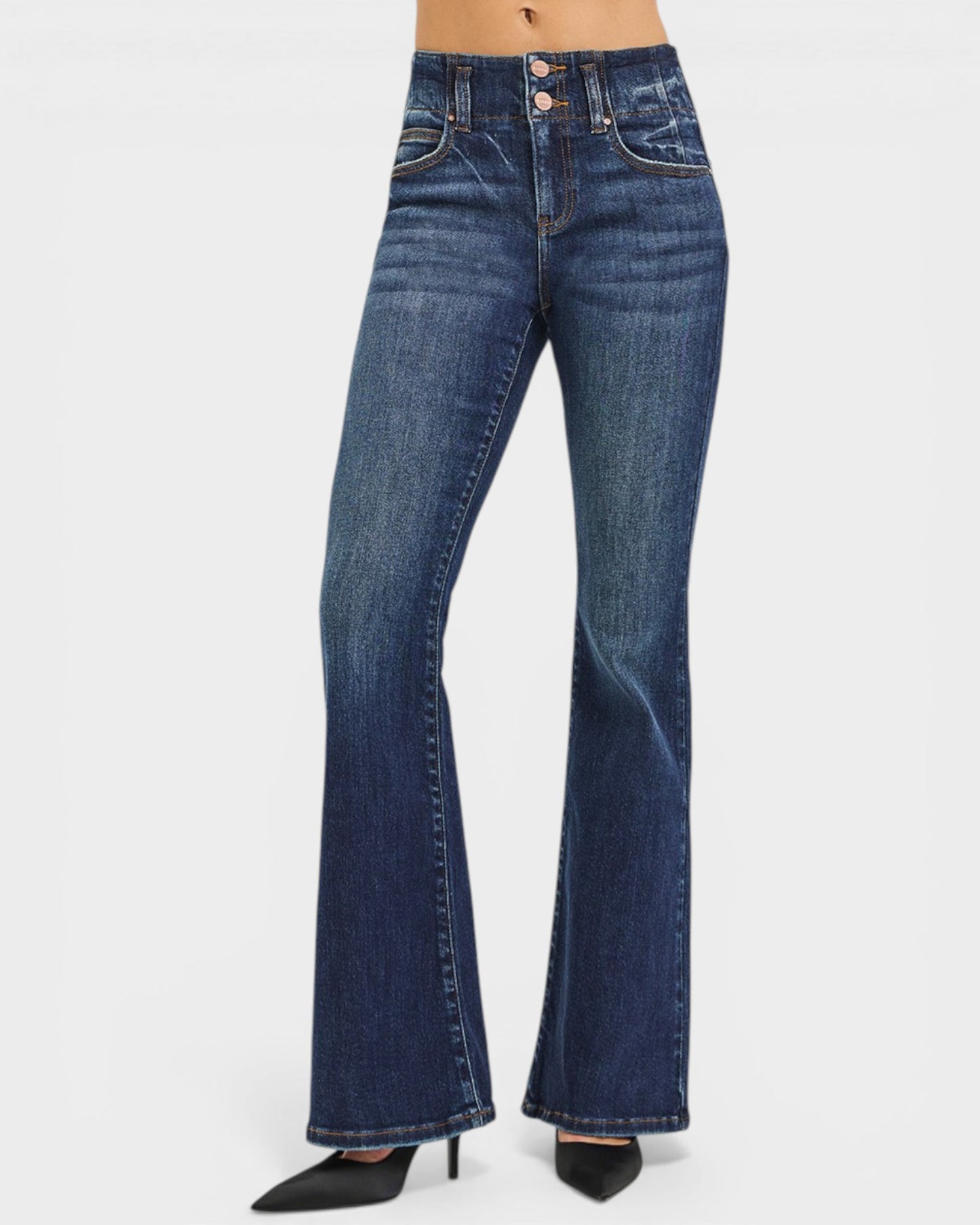 Blue flared jeans on a white background