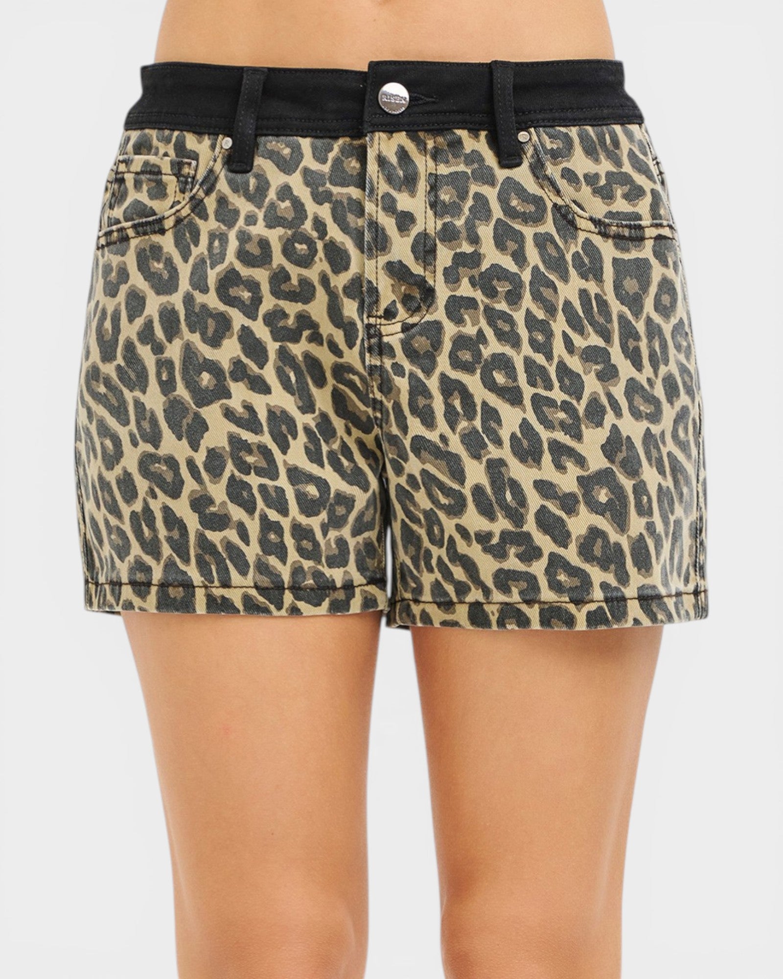 Leopard print shorts with a black belt on a white background