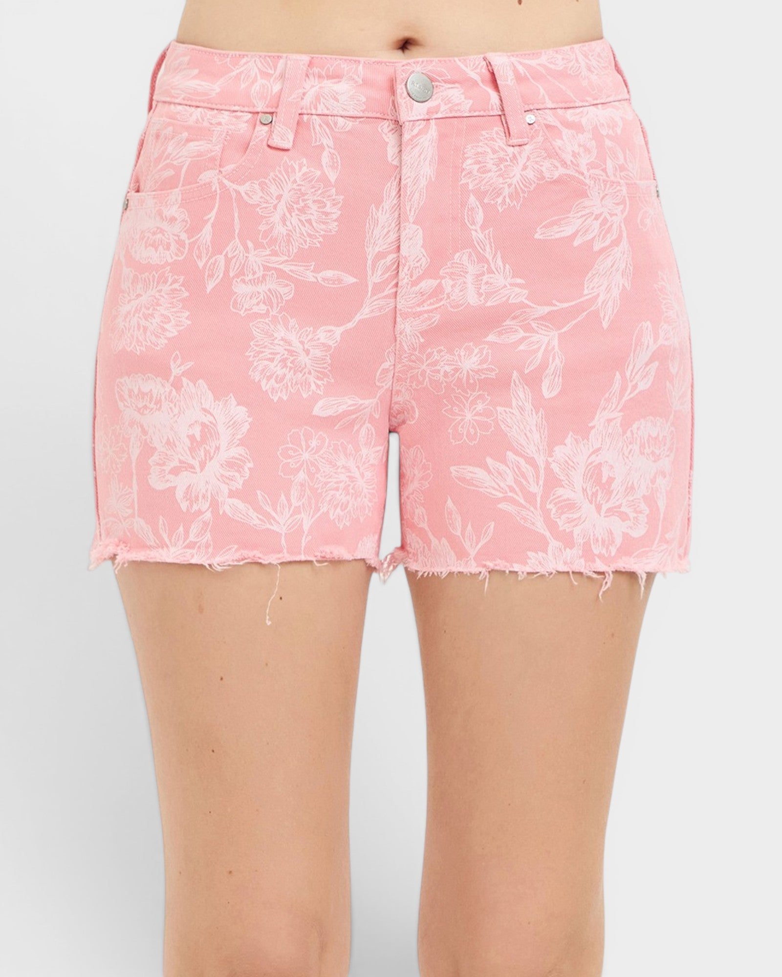 Pink floral shorts on a white background