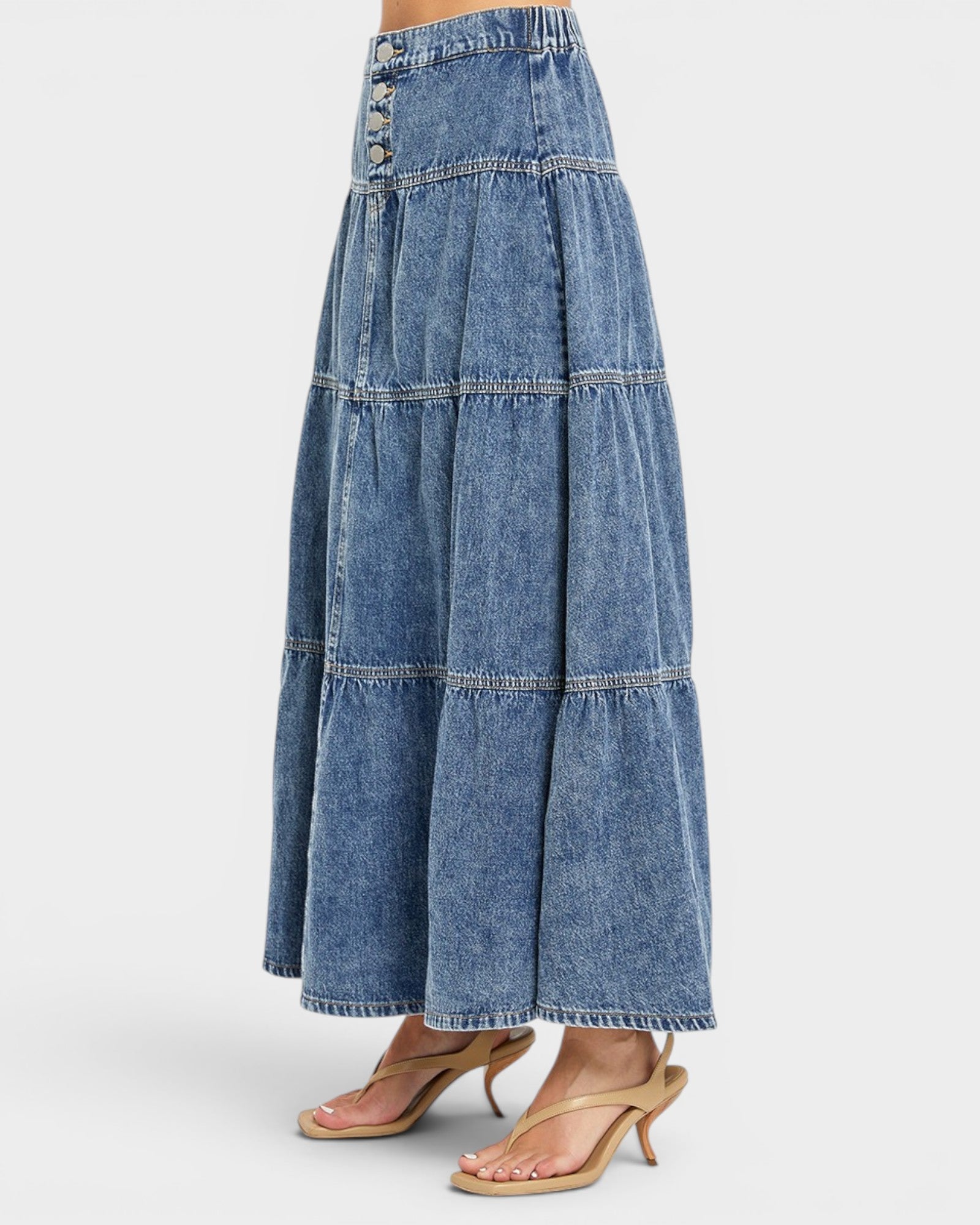 Long denim skirt on a white background