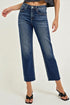 Person wearing blue jeans on a white background