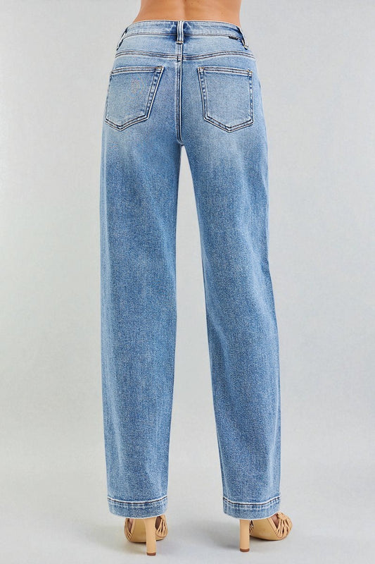 Light blue jeans on a plain background