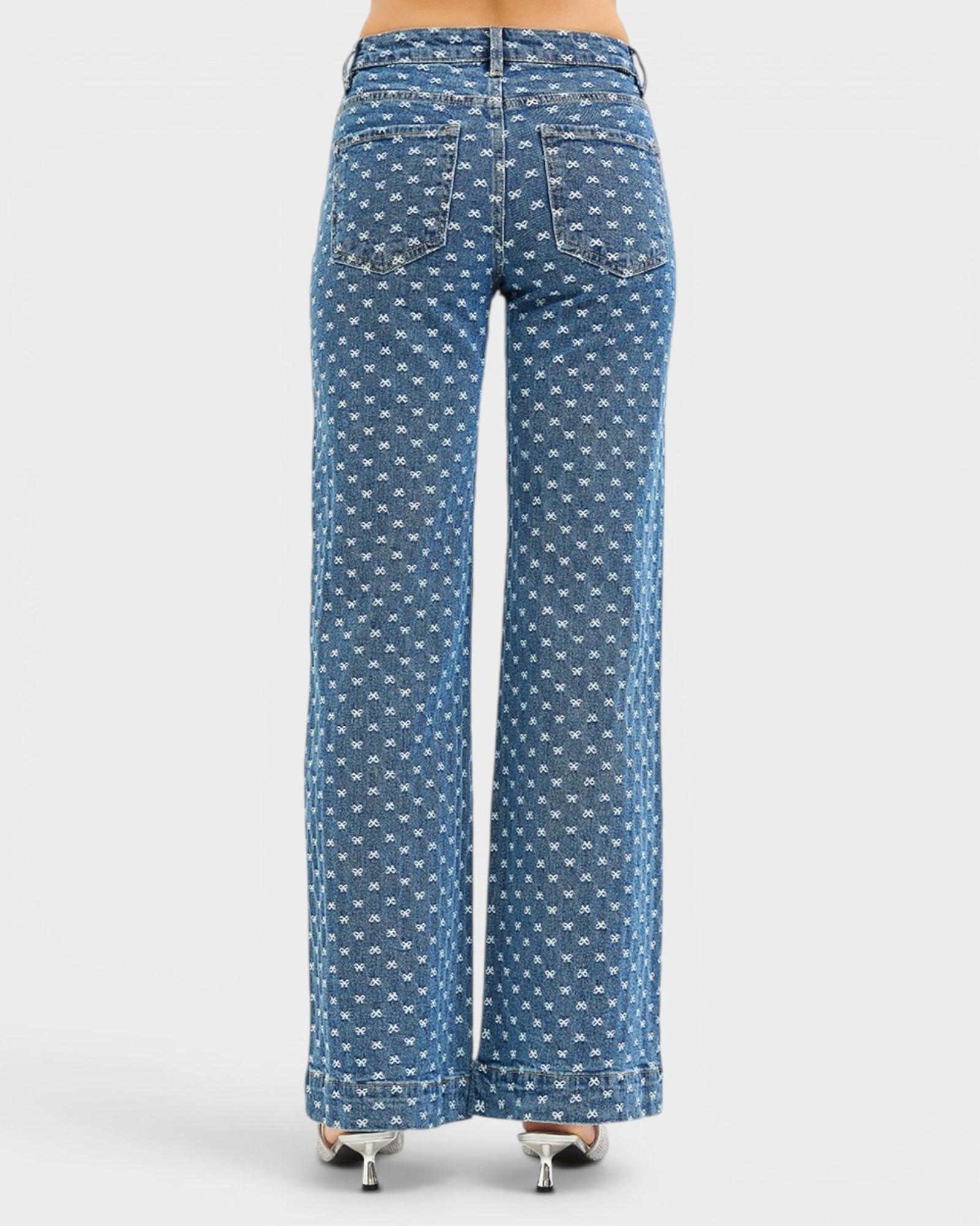 Blue patterned jeans on a white background