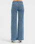 Blue patterned jeans on a white background